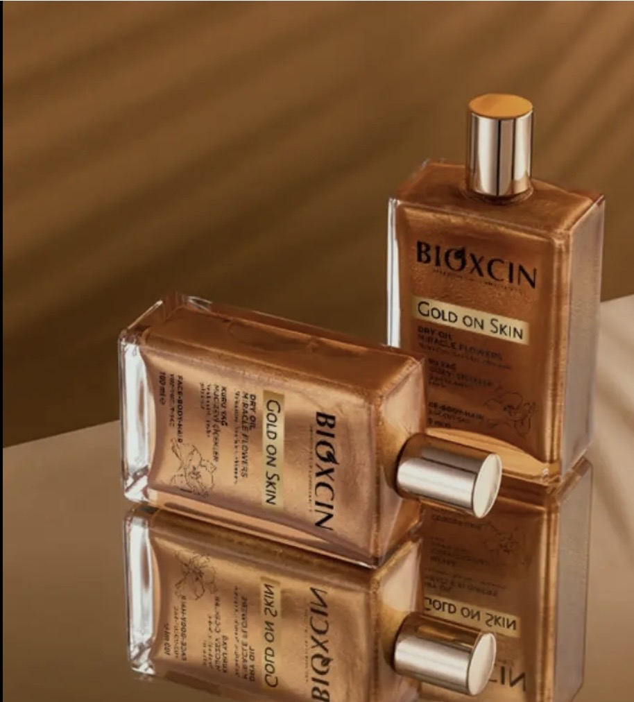 روغن مرطوب کننده و شاین صورت و بدن و مو بیوکسین Bioxin مدل Gold On Skin حجم 100 میل